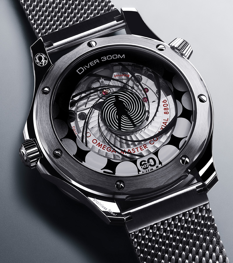 A watch movement being assembled by a watchmaker.